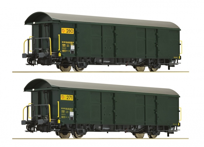 Set of 2 postal freight cars of Swisspost<br /><a href='images/pictures/Roco/230972.jpg' target='_blank'>Full size image</a>